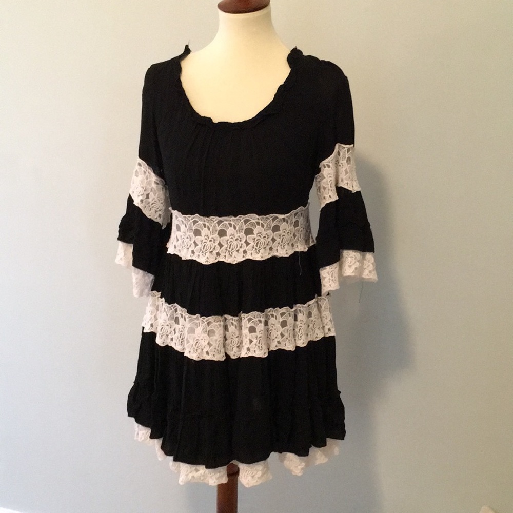 Black Ruffled Dress with White Lace